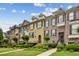 Charming townhomes feature a mix of brick and siding exteriors, manicured lawns, and inviting curb appeal at 1229 Concord Se Rd, Smyrna, GA 30080