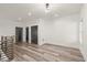 Spacious bedroom with wood floors, recessed lighting, and dark closets, providing ample storage space at 2327 Mason Dr # D23, Atlanta, GA 30316