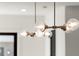Modern kitchen light with glass bulbs and bronze hardware at 2327 Mason Dr # D23, Atlanta, GA 30316