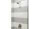 Close up of shower featuring grey and white tiling and chrome fixtures at 2327 Mason Dr # D23, Atlanta, GA 30316