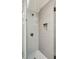 This renovated bathroom features a tiled shower with modern fixtures at 608 Sherwood Ne Rd, Atlanta, GA 30324