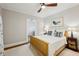 Bright bedroom with hardwood floors, a wood-framed bed, and neutral decor at 608 Sherwood Ne Rd, Atlanta, GA 30324