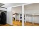 Spacious walk-in closet with custom shelving and ample storage space at 608 Sherwood Ne Rd, Atlanta, GA 30324