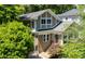 Charming home with a well-maintained exterior, brick foundation, gable roof, and inviting front entrance at 608 Sherwood Ne Rd, Atlanta, GA 30324