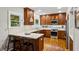 Kitchen features custom wood cabinets, stainless steel appliances and quartz countertops at 608 Sherwood Ne Rd, Atlanta, GA 30324