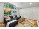 Bright living room with hardwood floors, vaulted ceilings, and a comfortable sectional sofa at 608 Sherwood Ne Rd, Atlanta, GA 30324