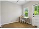 Home office featuring a desk, a chair, and a view to the exterior at 608 Sherwood Ne Rd, Atlanta, GA 30324