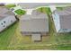 An aerial view shows the home's backyard and position in the neighborhood at 6100 Misty Hill Ln, Buford, GA 30518