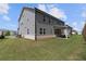 Spacious backyard with a covered patio, perfect for outdoor gatherings at 6100 Misty Hill Ln, Buford, GA 30518