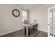 Dedicated home office with modern desk, natural light, and hardwood flooring at 6100 Misty Hill Ln, Buford, GA 30518