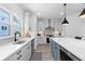 Bright kitchen with ample counter space, undermount sink, and stainless steel appliances at 3319 Stillwood Ln, Hapeville, GA 30354
