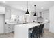 Modern kitchen with large island, sleek cabinets, and stainless steel appliances at 3319 Stillwood Ln, Hapeville, GA 30354