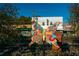 Sculptural butterfly with colorful painted design on a metal post, a vibrant art piece in an outdoor setting at 3319 Stillwood Ln, Hapeville, GA 30354