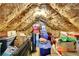 The attic contains insulation and storage space, with easy access for storing belongings at 4050 Pleasant Woods Dr, Cumming, GA 30028