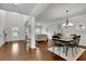 Chic dining room featuring hardwood floors, neutral paint, and open layout at 4050 Pleasant Woods Dr, Cumming, GA 30028