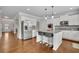 Beautiful open kitchen with stainless steel appliances, granite countertops and a spacious island at 4050 Pleasant Woods Dr, Cumming, GA 30028