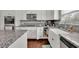 Well-equipped kitchen with granite countertops, stainless steel appliances and plenty of storage at 4050 Pleasant Woods Dr, Cumming, GA 30028