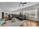 Spacious living room showcases modern decor, and open floor plan, and abundant natural light at 4050 Pleasant Woods Dr, Cumming, GA 30028