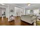 Comfortable living room features hardwood floors, neutral paint, and open layout at 4050 Pleasant Woods Dr, Cumming, GA 30028