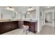 The main bathroom features a double vanity, dark cabinets, and granite countertops at 4050 Pleasant Woods Dr, Cumming, GA 30028
