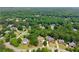 An aerial view showcasing the real estate's location within a lush, green neighborhood at 4525 E Point Dr, Cumming, GA 30041