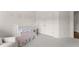 Bedroom with a crib and a closet at 4525 E Point Dr, Cumming, GA 30041