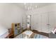 bedroom with lots of space and a small table and chairs at 4525 E Point Dr, Cumming, GA 30041