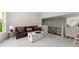 Upstairs bonus room featuring plush carpets and a comfy seating area at 4525 E Point Dr, Cumming, GA 30041