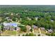 Aerial neighborhood view showing the home's location amidst trees and nearby houses at 4525 E Point Dr, Cumming, GA 30041