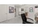 Bright office space with neutral colors, a modern chandelier, and plenty of natural light at 4525 E Point Dr, Cumming, GA 30041