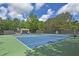 Outdoor tennis courts in a community setting, perfect for recreational activities at 4525 E Point Dr, Cumming, GA 30041