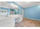 Bright bathroom featuring double vanity, tile floor, and large mirror at 508 Canton Ct, Canton, GA 30115