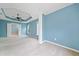 A spacious bedroom with a ceiling fan, tray ceiling and plush carpeting at 508 Canton Ct, Canton, GA 30115