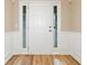 A bright entryway showcases wainscoting, fresh paint, and modern flooring at 508 Canton Ct, Canton, GA 30115