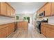 Well-lit kitchen with stainless steel appliances and ample counter space for cooking prep at 508 Canton Ct, Canton, GA 30115