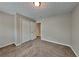 Cozy bedroom with soft carpet flooring and a well-lit ambiance at 1311 Bustling Sw Ln, Marietta, GA 30064