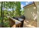 Wooden back deck area with two covered BBQ grills at 1686 Brooks Farm Nw Dr, Acworth, GA 30101