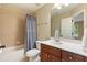 Bathroom with tile surround and vanity at 1686 Brooks Farm Nw Dr, Acworth, GA 30101