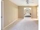 Bonus room with plush carpet leading into carpeted bedroom with ceiling fan at 1686 Brooks Farm Nw Dr, Acworth, GA 30101