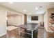 Game room with ping pong table, TV, and rustic decor elements at 1686 Brooks Farm Nw Dr, Acworth, GA 30101