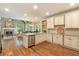 Bright kitchen with stainless steel appliances, granite countertops, and an open layout at 1686 Brooks Farm Nw Dr, Acworth, GA 30101