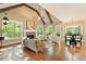 Living room with vaulted ceilings, fireplace, hardwood floors, and lots of natural light at 1686 Brooks Farm Nw Dr, Acworth, GA 30101