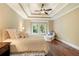 The main bedroom is spacious and features hardwood floors, a sitting area and natural light at 1686 Brooks Farm Nw Dr, Acworth, GA 30101