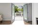 Doors leading out to a balcony with a view of the greenery and the house at 364 Glendale Ne Ave # B, Atlanta, GA 30307