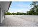 Expansive balcony with tiled flooring and a white railing, ideal for outdoor relaxation and entertainment at 364 Glendale Ne Ave # B, Atlanta, GA 30307