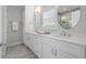 Elegant bathroom with double vanity, quartz countertops, and shaker cabinets at 364 Glendale Ne Ave # B, Atlanta, GA 30307