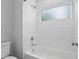 A clean, modern bathroom with white subway tile and a bathtub-shower combination at 364 Glendale Ne Ave # B, Atlanta, GA 30307