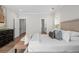 Bright bedroom with hardwood floors and a view into the ensuite bathroom at 364 Glendale Ne Ave # B, Atlanta, GA 30307