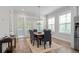 Bright dining room with wood floors, natural light, and a stylish light fixture at 364 Glendale Ne Ave # B, Atlanta, GA 30307