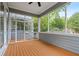Inviting screened porch with wood flooring, offering an ideal outdoor living space at 364 Glendale Ne Ave # B, Atlanta, GA 30307